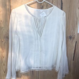 Aster XS new with tags. Fits like a small. White/ivory delicate light weight